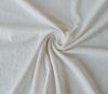 Ekrü színű rugalmas műszálas Maradék Textil nyomott virág motívummal - 150 x 120cm 