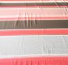 Narancssárga - barna csíkozású viscose textil 100x170 cm