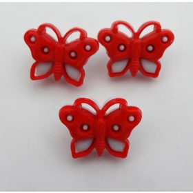 Piros lepke alakú műanyag gomb, füles, mérete 15 mm, 10db-os kiszerelésben.