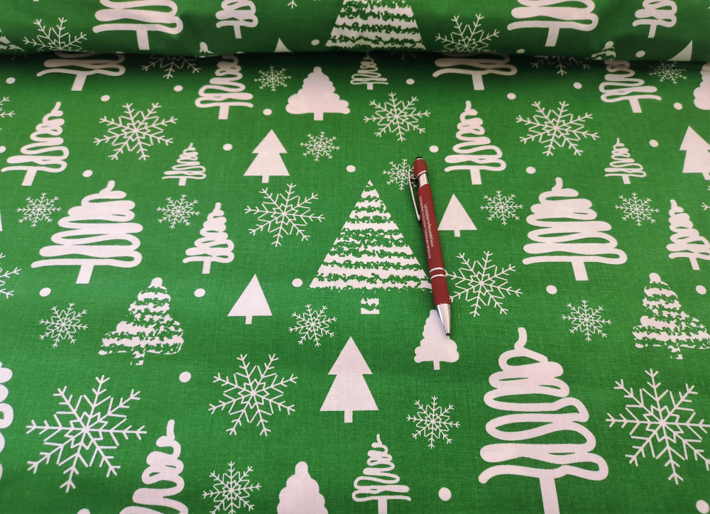 Karácsonyi pamutvászon méteráru zöld alapon fehér fenyőfa - hópehely mintás- 160 cm széles
