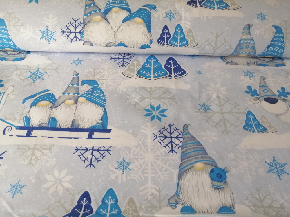 Világos kék manós karácsonyi pamutvászon textília 160 cm széles