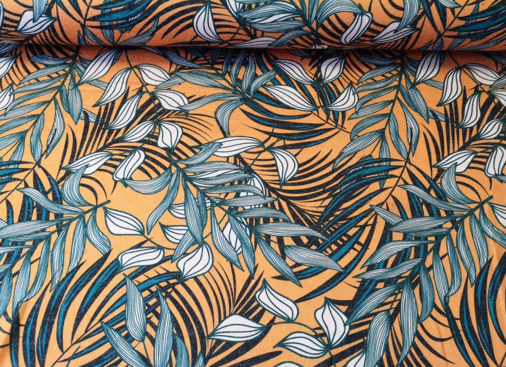 Narancssárga alapon trópusi levél mintás jacquard textil - 150 cm